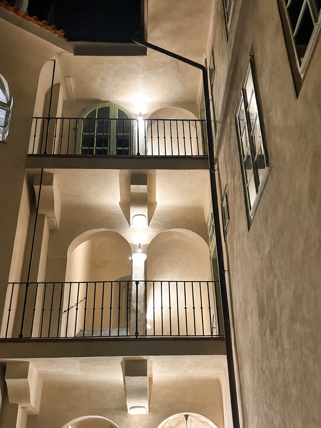 Courtyard galleries of the house at night